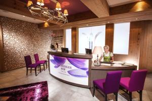 A seating area at Waidringer Hof 4 Sterne Superior