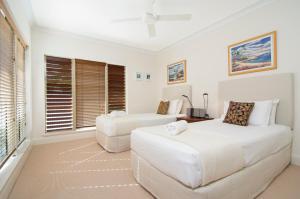 Letto o letti in una camera di Paradise Links Resort Port Douglas