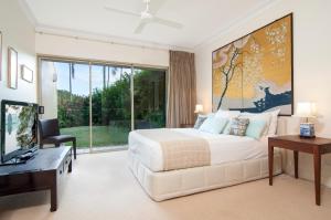 Letto o letti in una camera di Paradise Links Resort Port Douglas