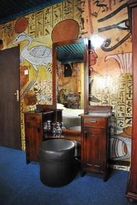 a bathroom with a sink and a mirror at Guesthouse Prenociste Faraon in Pljevlja