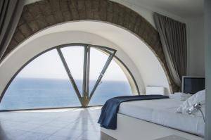 Posteľ alebo postele v izbe v ubytovaní Sunrise Guest House