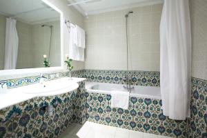 Een badkamer bij El Mouradi Cap Mahdia