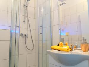 Kúpeľňa v ubytovaní Apartments CITY Stadion + 37 fotografií