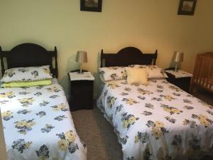Voodi või voodid majutusasutuse Laurel Lodge toas