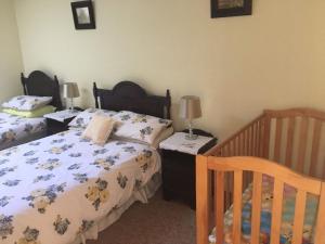 Voodi või voodid majutusasutuse Laurel Lodge toas