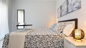 Postel nebo postele na pokoji v ubytování Villa Isla Feliz