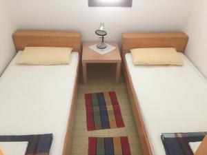 Posteľ alebo postele v izbe v ubytovaní Apartments Lavanda