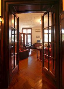 a living room with a couch and a table at Apartment Parliament park in Belgrade