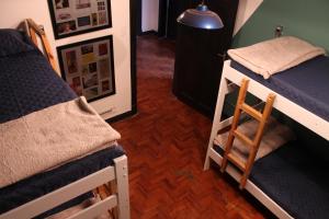 Ένα ή περισσότερα κρεβάτια σε δωμάτιο στο NeighborHUB hostel e coliving