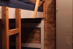 Μία ή περισσότερες κουκέτες σε δωμάτιο στο NeighborHUB hostel e coliving