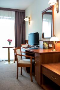 Telewizja i/lub zestaw kina domowego w obiekcie Hotel Great Polonia Conrad Kraków