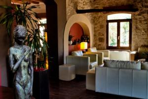 Posezení v ubytování Molí Blanc Hotel