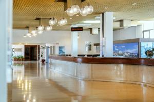 a lobby of a hospital with a waiting area at Hotel Zagreb in Split