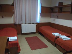 Postel nebo postele na pokoji v ubytování Study K & M Hotel