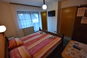 Postel nebo postele na pokoji v ubytování Guest House Žnidar