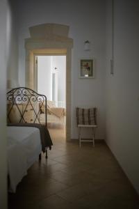 A bed or beds in a room at Nuvole Barocche