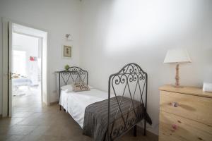 A bed or beds in a room at Nuvole Barocche