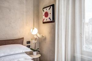 Posteľ alebo postele v izbe v ubytovaní G55 Design Hotel