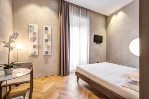 Posteľ alebo postele v izbe v ubytovaní G55 Design Hotel