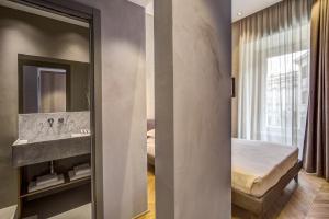 Posteľ alebo postele v izbe v ubytovaní G55 Design Hotel