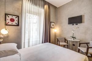 Posteľ alebo postele v izbe v ubytovaní G55 Design Hotel