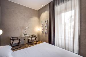 Posteľ alebo postele v izbe v ubytovaní G55 Design Hotel