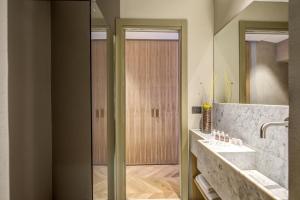 Kúpeľňa v ubytovaní G55 Design Hotel