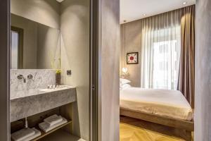 Posteľ alebo postele v izbe v ubytovaní G55 Design Hotel