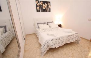 Postel nebo postele na pokoji v ubytování Casa de Vacaciones Ribot