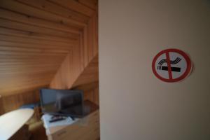 TV a/nebo společenská místnost v ubytování Inkliuzas