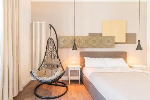 Postel nebo postele na pokoji v ubytování Guest Roma House