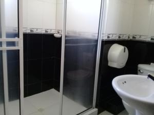 Koupelna v ubytování Hotel Dainner