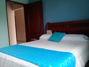 Postel nebo postele na pokoji v ubytování Hotel Dainner