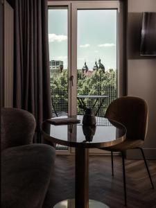 TV a/nebo společenská místnost v ubytování Mauritzhof Hotel Münster