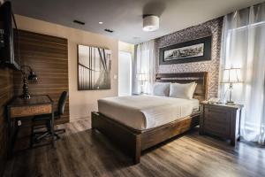 Ein Bett oder Betten in einem Zimmer der Unterkunft The Gallivant Times Square