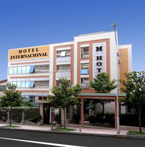 a building with a hotel international sign on it at Fieri International Hotel in Fier