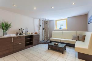 A seating area at Hotel Goldene Rose