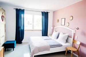 Katil atau katil-katil dalam bilik di ElbQuartier Apartments Magdeburg 'Die Stadtoase'