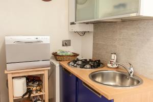 A kitchen or kitchenette at Renaissance Boutique House