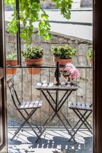 A balcony or terrace at Renaissance Boutique House