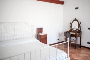 A bed or beds in a room at Renaissance Boutique House