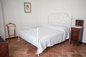A bed or beds in a room at Renaissance Boutique House
