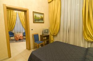 Posteľ alebo postele v izbe v ubytovaní Hotel Alba + 16 fotografií