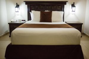Hotel Go Inn tesisinde bir odada yatak veya yataklar