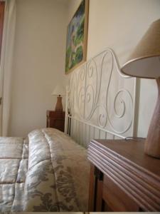 Postel nebo postele na pokoji v ubytování Affittacamere La Casa Di Elide