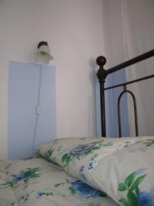 Postel nebo postele na pokoji v ubytování Affittacamere La Casa Di Elide