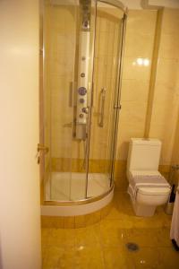 Koupelna v ubytování Hotel Drosia
