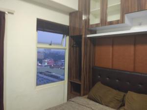 Postel nebo postele na pokoji v ubytování DSV Margonda Residen 2 Apartment