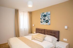 Postel nebo postele na pokoji v ubytování Villa Orljak