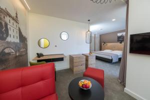 Postel nebo postele na pokoji v ubytování Boutique Hotel Esplanade